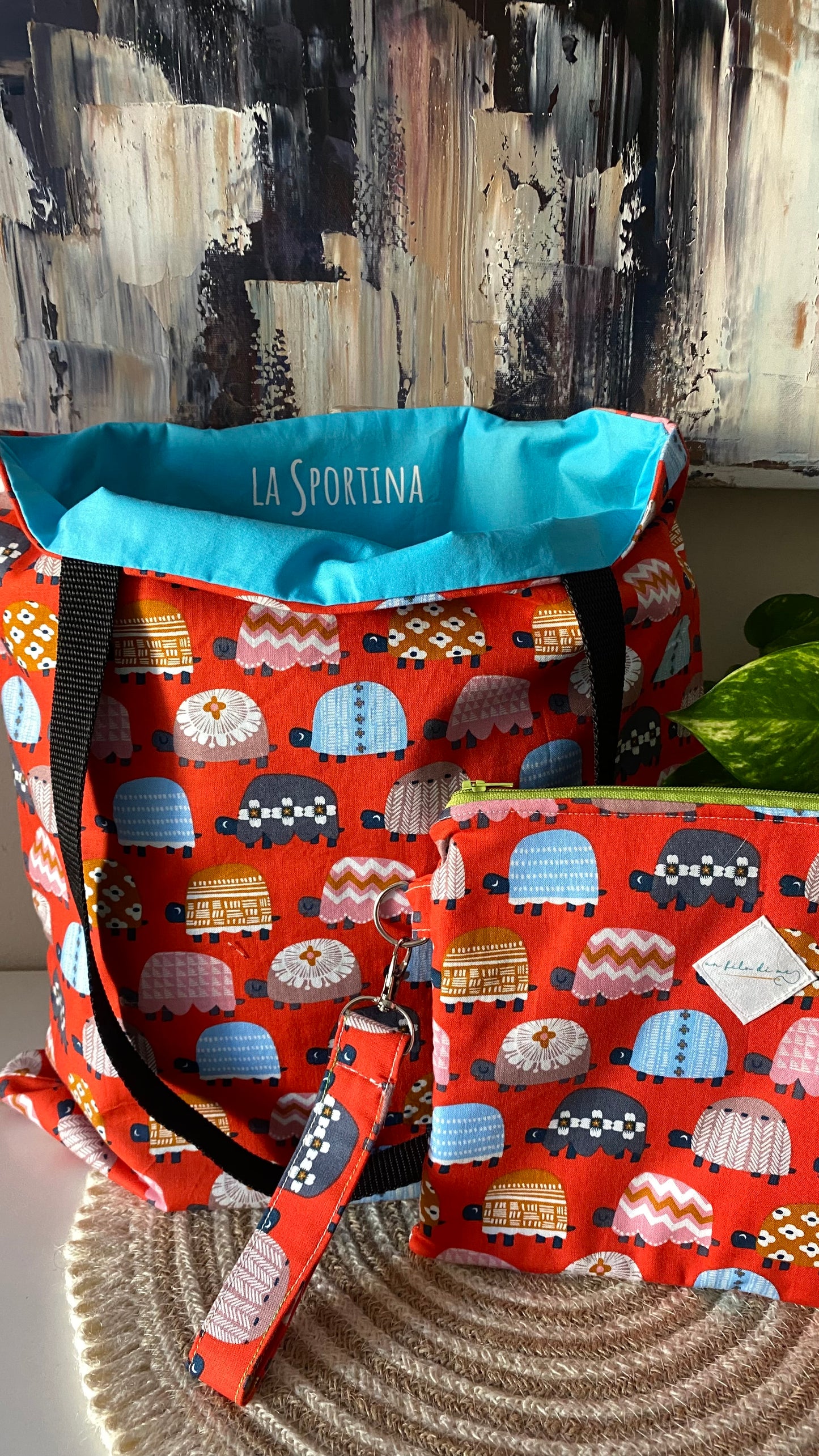 La Sportina + pochette grande tartarughe con polsino portachiavi